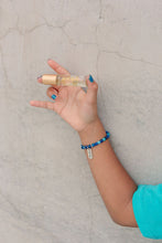 Load image into Gallery viewer, SPEAK YOUR TRUTH BUNDLE (KID'S T-SHIRT, OIL & BRACELET)